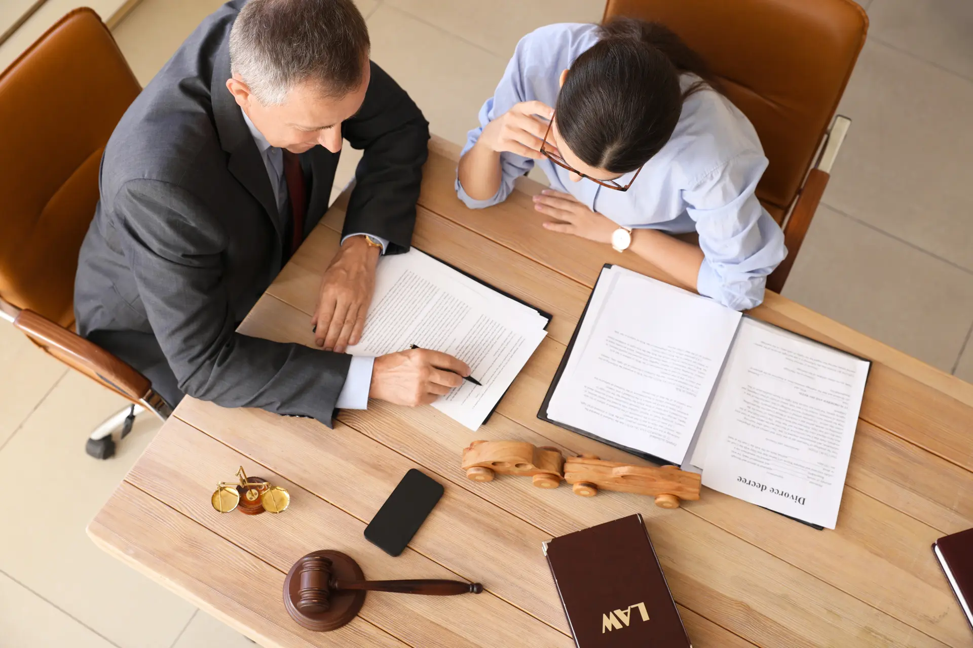 2 people discussing contract
